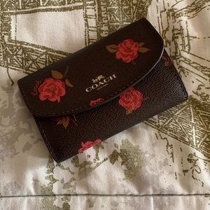 Coach key case with peony print